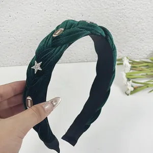Dark green velvet braided headband with rhinestone star and metallic football charms detail.
