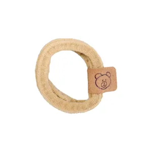 Minimalist brown hair tie with cute bear leather tag, high elasticity ponytail holder.