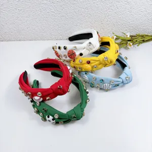 Colorful knotted fabric headbands decorated with sparkling rhinestones and cute sports ball charms for women.