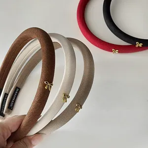 Minimalist fabric headband with cute metal bow, stylish thick sponge hair hoop for women.