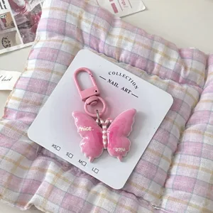 Pink butterfly bag charm keychain sweet cute accessory with nice letter detail and display card.