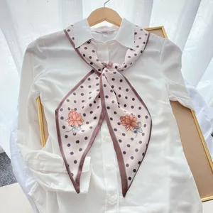 Chic long silk scarf with polka dot and floral print, elegant women neckerchief accessory.