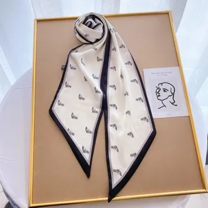 Elegant long silk scarf with classic horse head print and chic contrast borders for women.