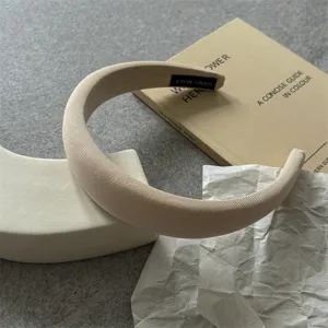 Minimalist plain padded sponge hair hoop for women, comfortable thick solid color hair band daily.