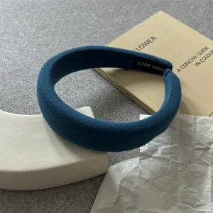 Dark blue thick sponge headband, minimalist solid color fabric hair hoop for daily fashion wear.
