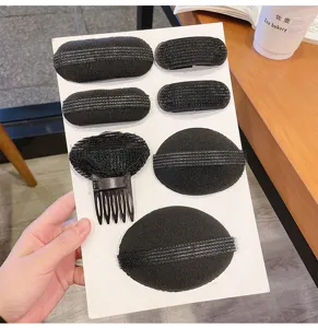 Hair volume insert pads detail view, black sponge hair root booster styling tools set.
