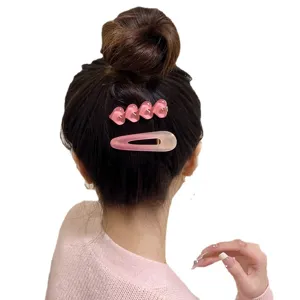 Joli ensemble de pinces à cheveux rose avec un design de cœur mignon pour le style quotidien.