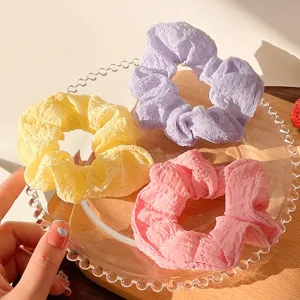 Colorful puff scrunchies set for women, soft fabric hair ties for cute daily hairstyles.