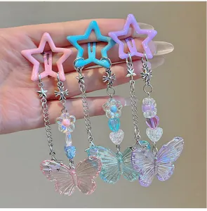 Detailed view of Y2K dopamine star and laser butterfly beaded tassel hair clip set.