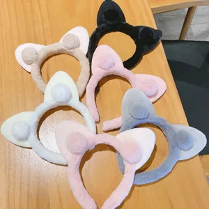 Cute plush cat ear headband for women, soft winter hair hoop, sweet fluffy hair accessories.