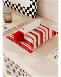 Modern red and white striped tissue box cover with cute fluffy pom-pom home decor accessory