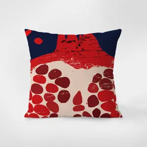 Primo piano dettagliato della stampa melograno pop art sul tessuto del cuscino.