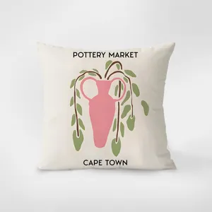 Close-up detail of the decorative throw pillow featuring botanical pottery print and minimalist style.
