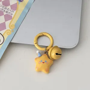 Cute yellow star bell keychain with round clasp, sweet girl bag pendant gift accessory.