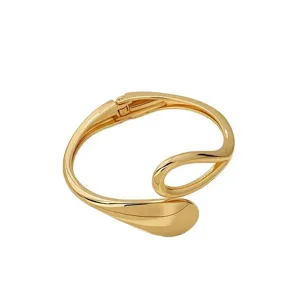 Gold open cuff bracelet for women, metal vintage geometric arm bangle fashion jewelry accessory.