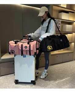 Large capacity travel duffel bag for women, commuting fitness gym luggage bag with wheels.