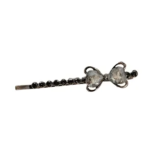 Pince à cheveux noire en cristal strass, barrette élégante pour frange de femme.