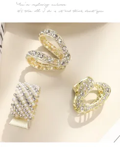 Gold rhinestone and pearl hair claw clips, elegant small hair accessories for half up hair.