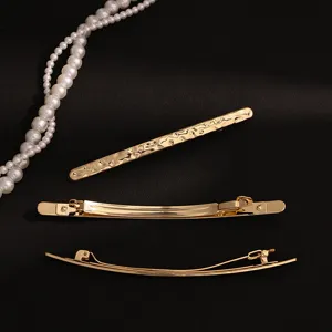 Elegant gold tone metal hair barrette set with irregular texture and spring clip design for women.