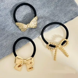 Y2K style gold metal bow hair ties set, stylish black elastic hair ropes for women daily wear.