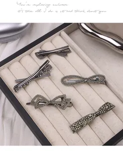 Shiny rhinestone hair clips set, elegant metal side hairpins for women and girls daily styling.