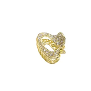 Gold rhinestone small hair claw clip for women, sparkling crystal half up hair styling tool.