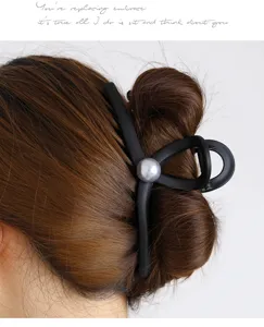 Oversized matte black hair claw clip with pearl, 15cm large shark clip for thick hair styling.