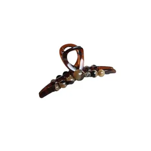Large Maillard tortoiseshell hair claw clip with elegant beads and rhinestones for thick hair.