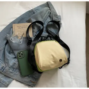 Chic color-blocked mini backpack and shoulder bag for women, stylish minimalist everyday carry.