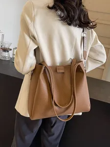 Minimalist leather shoulder bag for women, stylish brown casual tote and crossbody handbag.