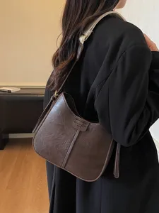 Minimalist women's shoulder bag, stylish PU leather hobo handbag for daily casual wear.