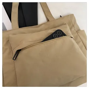 Bolso de hombro caqui detalle bolsillo frontal, gran capacidad bolso casual de moda.
