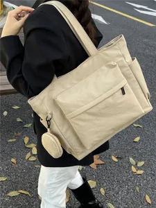 Bolso tote grande de lona para mujer, elegante bolso de hombro versatil para el trabajo.