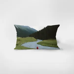 Rectangular velvet throw pillow with green landscape photography print for sofa and car.