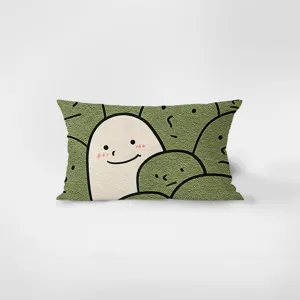 Close-up detail of a soft rectangular plush cushion featuring a cute cartoon smiling face design.