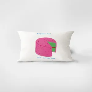 Close-up detail of white rectangular velvet throw pillow with cute pink cake graphic illustration.