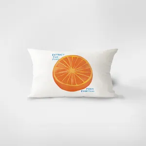 Rectangular cushion cover detail, featuring a vibrant orange slice graphic and modern typography.