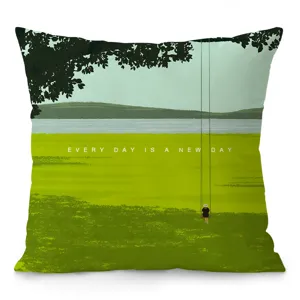 Detail view of the green forest landscape decorative throw pillow with scenic swing design.
