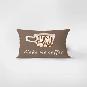 Detail shot of rectangular throw pillow with coffee cup graphic and print text cover.