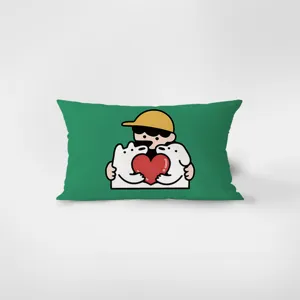 Green rectangular pillow cover featuring cute cartoon dogs and heart illustration detail.