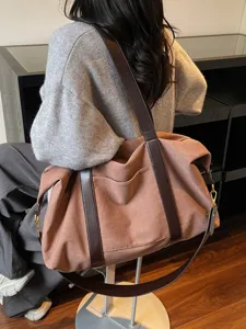 Large capacity canvas shoulder bag, casual contrast color travel duffel bag for women daily use.