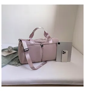Large capacity gym duffel bag for women, solid color single shoulder travel and yoga storage bag.