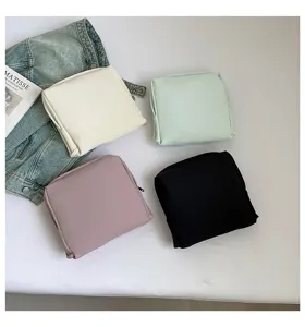 Minimalist solid color cosmetic bag large capacity travel storage pouch practical organizer.