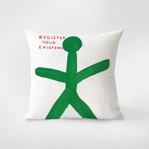 Detailed view of white decorative throw pillow featuring unique green abstract painted figure and text.