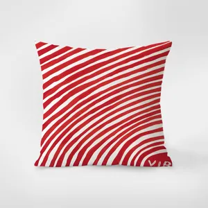 Close-up view of the modern red and white striped abstract decorative throw pillow cover.