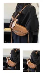 Stylish women's brown saddle bag PU leather underarm shoulder bag with chic silk scarf detail.