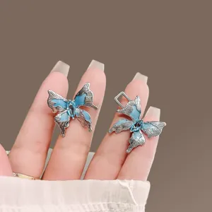 Fibbia stringi vita a farfalla blu per jeans, regolatore di cintura in metallo elegante.