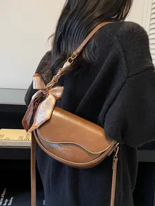 Women brown saddle shoulder bag chic crossbody PU leather handbag with scarf decor daily use