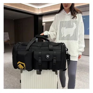 Large capacity black travel duffel bag with multi-pockets, ideal for gym and commuting use.