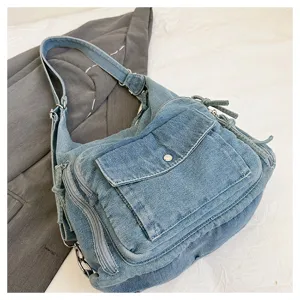 Fashionable casual denim shoulder bag for women, commuter crossbody messenger bag with front pocket.